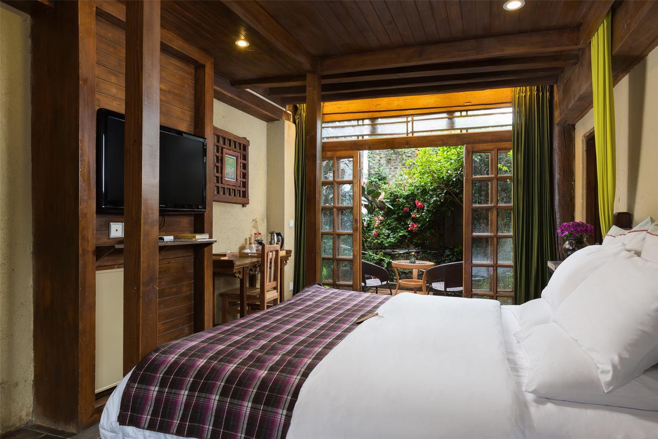 Blossom Hill Inn - Neverland Lijiang  Bagian luar foto